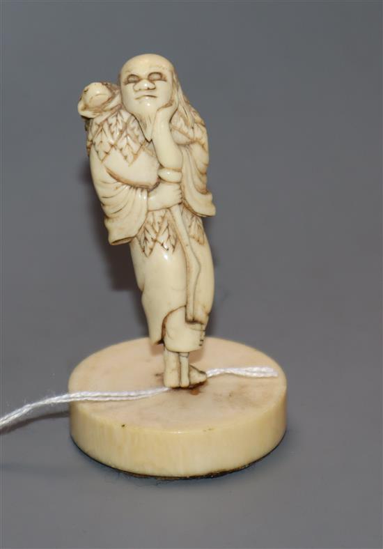 An 18th/19th century Japanese ivory netsuke of Gama Sennin, later mounted, height 9cm